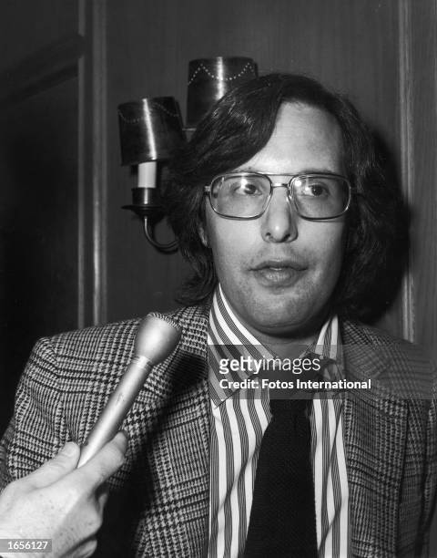 Headshot of American director William Friedkin being interviewed during a promotional party for his film, 'The Exorcist,' at Chasen's restaurant in...