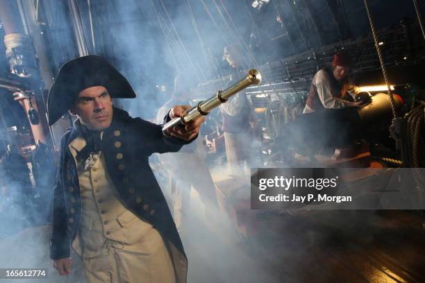 captain on battleship with navy telescope - reenactment stock pictures, royalty-free photos & images