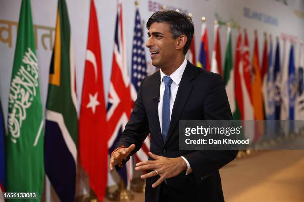 British Prime Minister Rishi Sunak speaks to media as he prepares to leave the G20 Summit on September 10, 2023 in New Delhi, Delhi. This 18th G20...