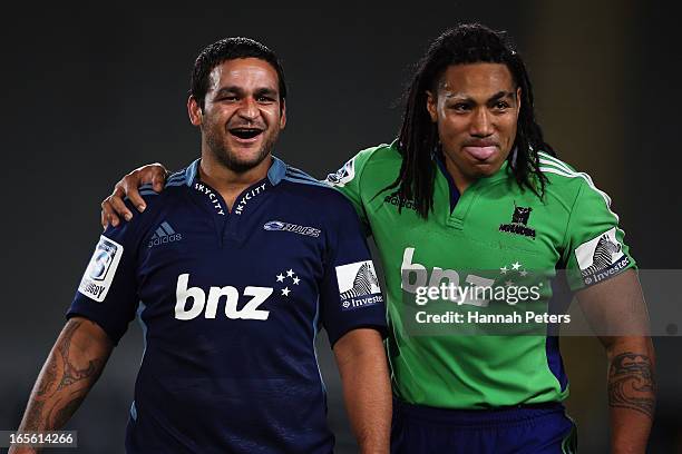 Piri Weepu of the Blues and Ma'a Nonu of the Highlanders walk off following the round eight Super Rugby match between the Blues and the Highlanders...