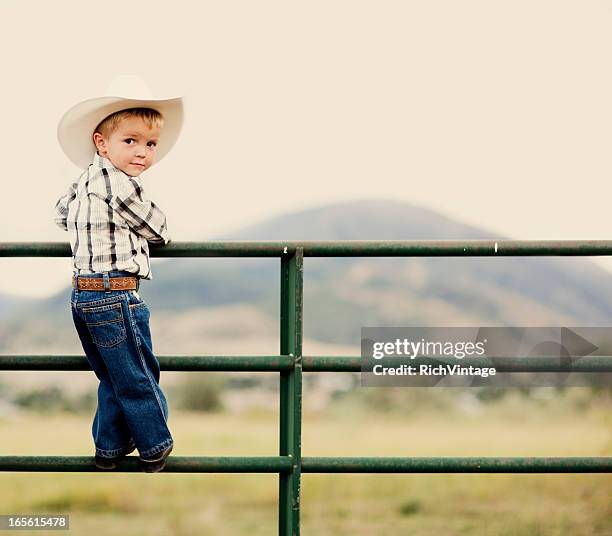 young cowboy - texas farm stock pictures, royalty-free photos & images