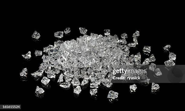 pile of faux uncut diamonds isolated on a black background - raw food stock pictures, royalty-free photos & images