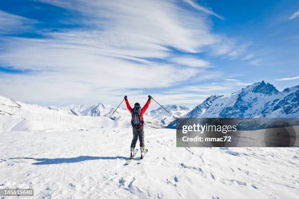 skier against spectacular mountainscape - grenoble stockfoto's en -beelden