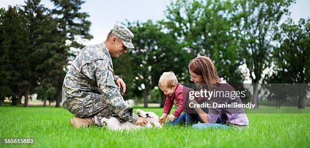 army family series: real american soldier with wife & son - armed forces military family stock pictures, royalty-free photos & images
