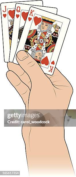 hand mit jack, queen-size-betten und herz-spielkarten mit king-size-bett - spielkarte bube stock-grafiken, -clipart, -cartoons und -symbole