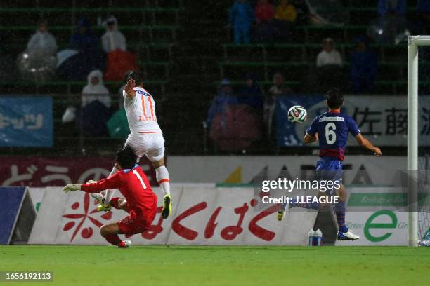 Zlatan Ljubijankic of Omiya Ardija scores his team's first goal during the J.League J1 match between Ventforet Kofu and Omiya Ardija at Yamanashi...