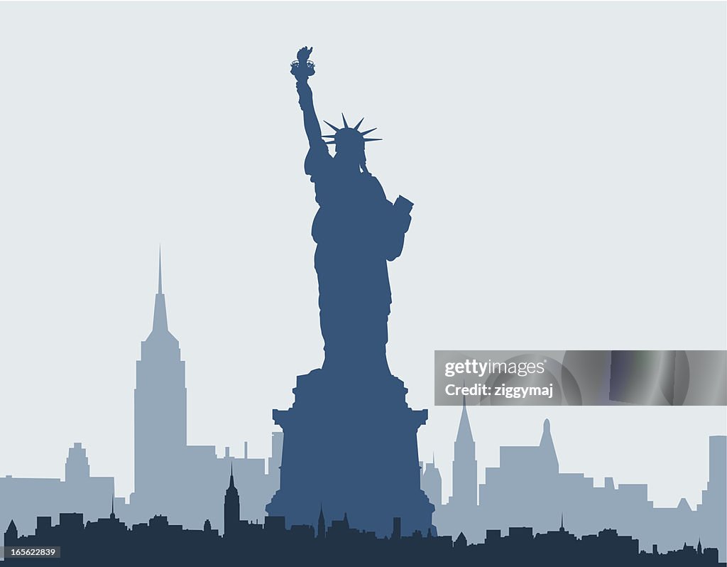 Blue silhouette of Statue of Liberty and New York skyline