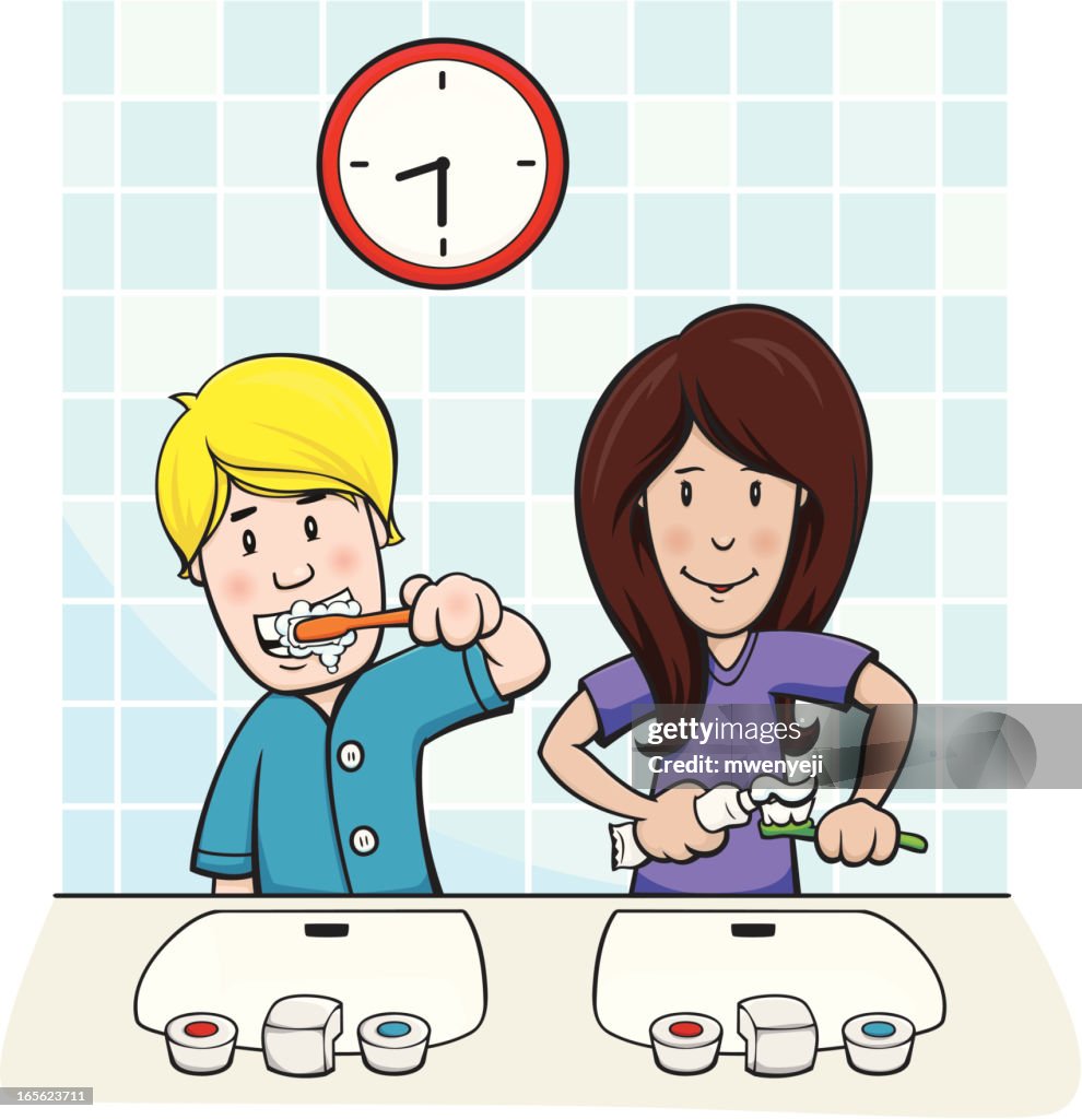 Children brushing their teeth before bed