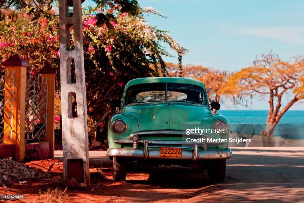 Classic oldtimer car at beach road