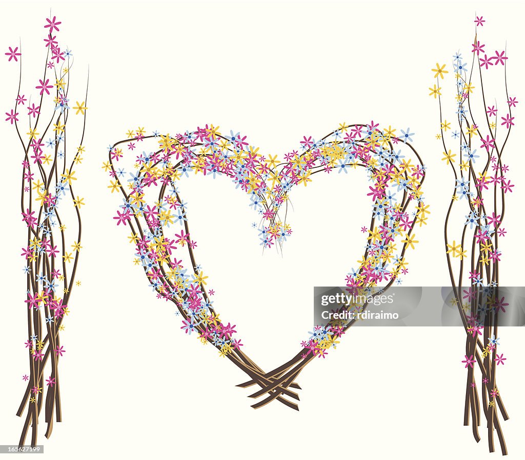 Corazón y ramas de flores