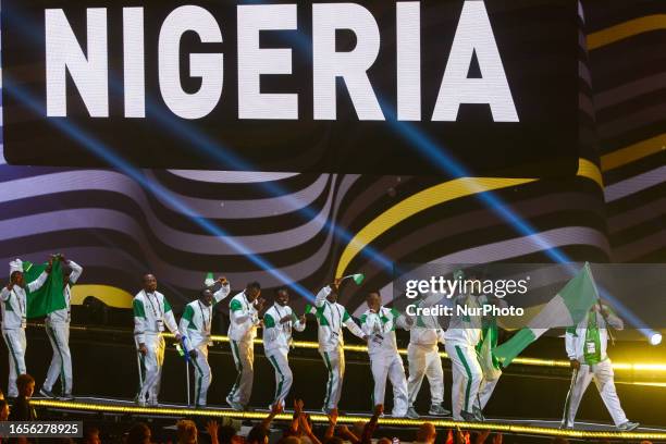 The Nigerian team is seen on the stage during the opening ceremony of the Invictus Games 2023 at the Merkur Spiel Arena in Duesseldorf, Germany on...