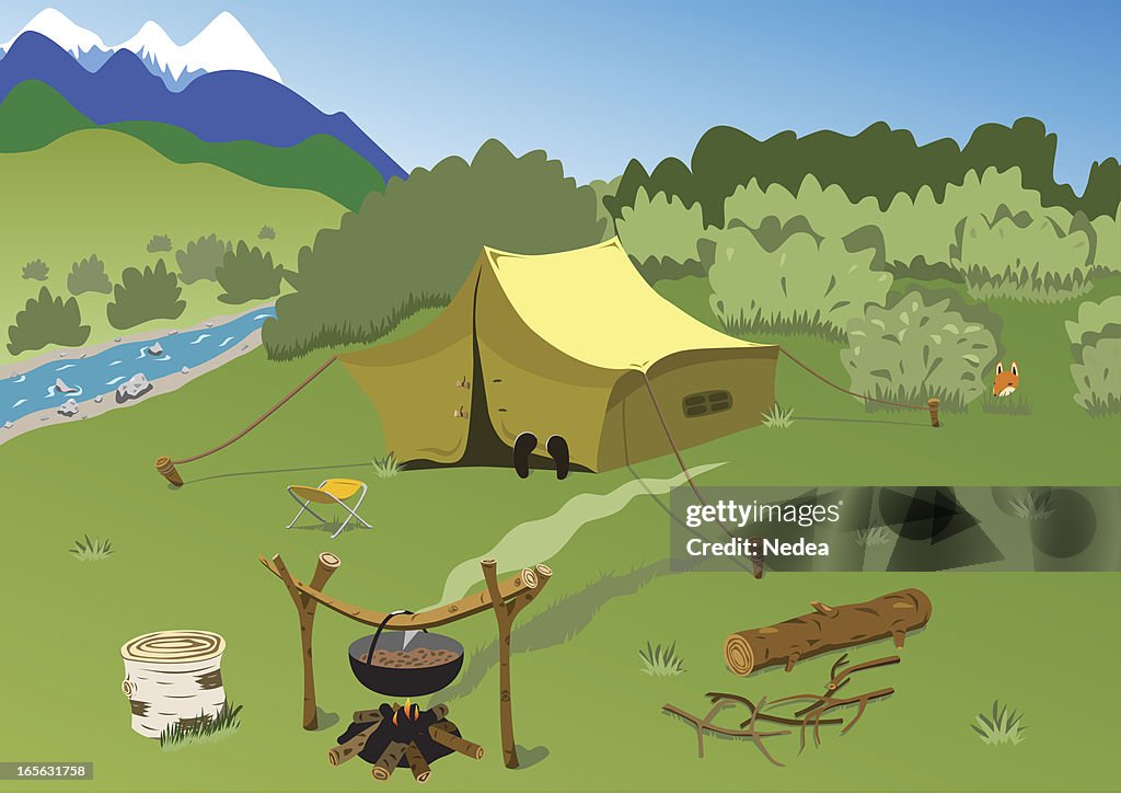 Tourist camp on the mountain river bank