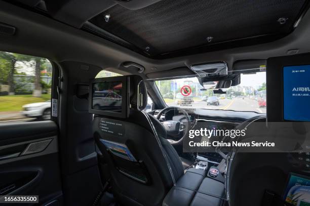 Baidu's Apollo Go Robotaxi drives on the street on September 2, 2023 in Chongqing, China.