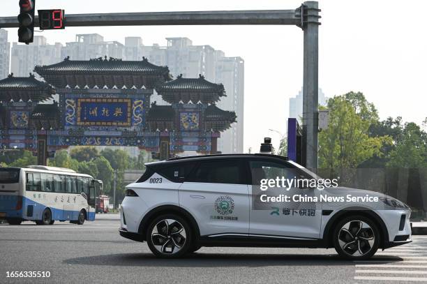 Baidu's Apollo Go Robotaxi drives on the street on September 2, 2023 in Chongqing, China.