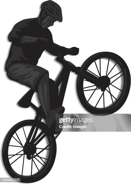 silhouette image of a male doing a bike jump trick - bmx freestyle stock illustrations