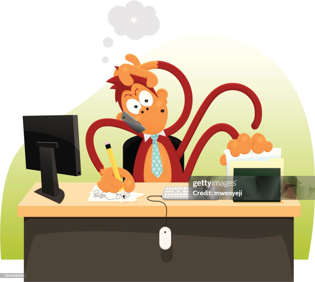 Confused and busy Monkey working a desk job
