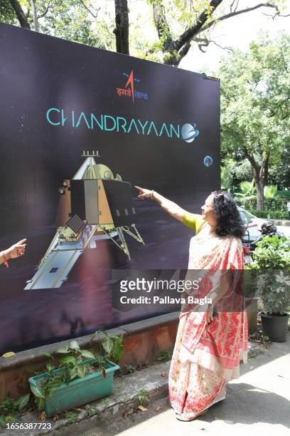 Bill boards adorn street sides in India, as the country of 1.4 billion people celebrates the successful soft landing on the moon surface by...
