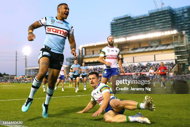 Sione Katoa of the Sharks celebrates scoring a try during the round 27 NRL match between Cronulla Sharks and Canberra Raiders at PointsBet Stadium on...