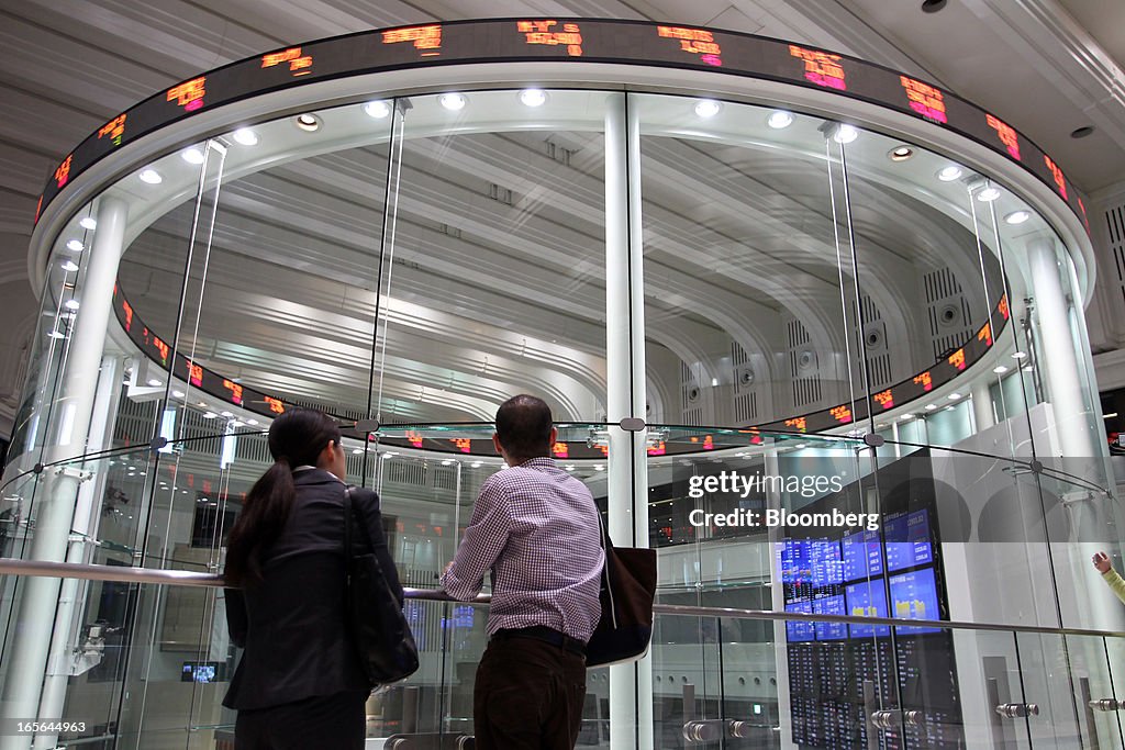 Images Of Tokyo Stock Exchange And Stock Boards As Japan Stocks Jump On BOJ Stimulus