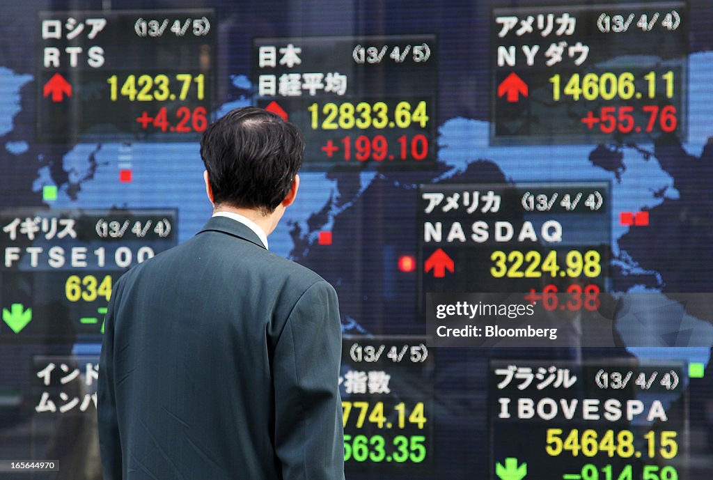 Images Of Tokyo Stock Exchange And Stock Boards As Japan Stocks Jump On BOJ Stimulus