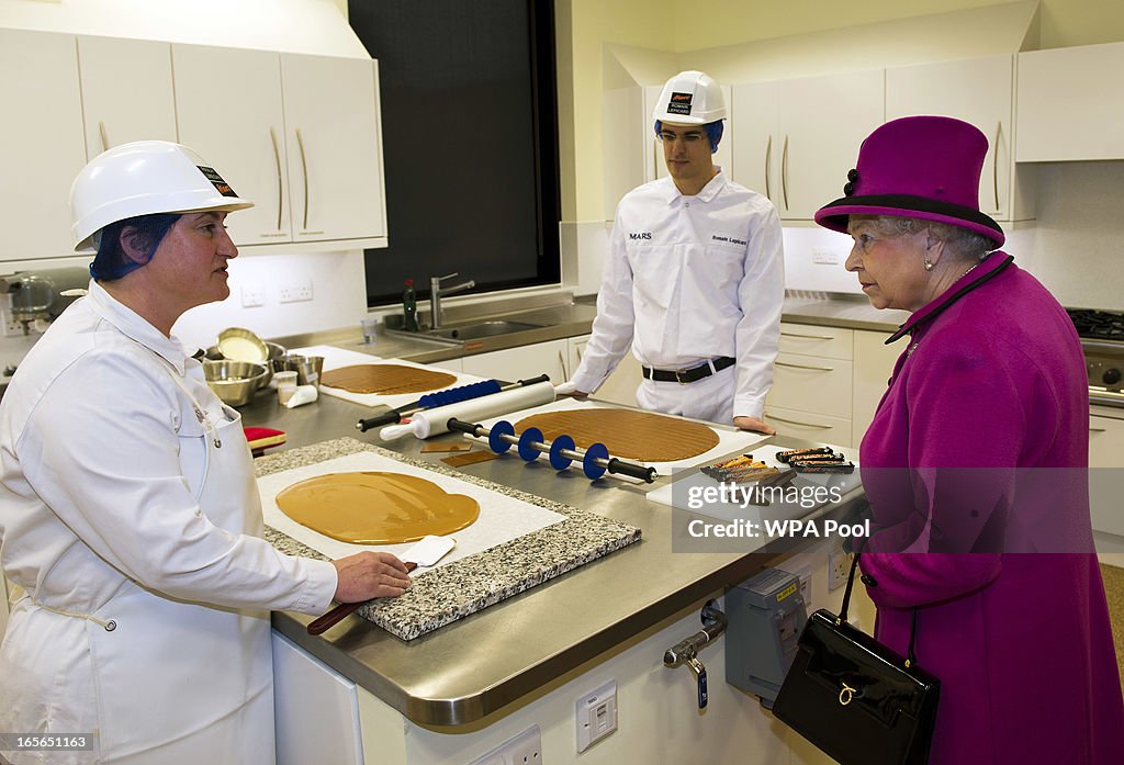 Queen Elizabeth II Visits Mars Chocolate