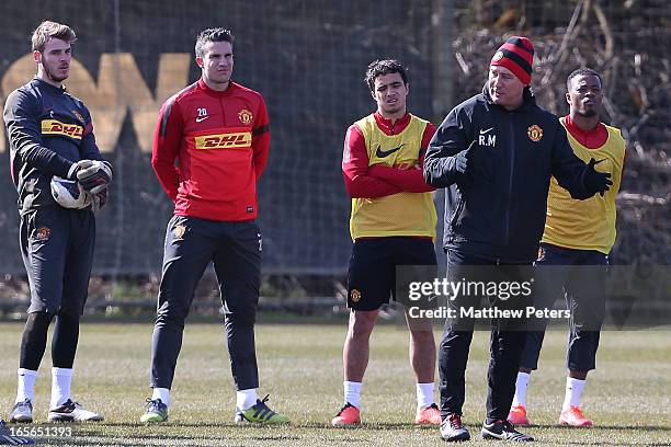 David de Gea, Robin van Persie, Rafael da Silva, First Team Coach Rene Meulensteen and Patrice Evra of Manchester United in action during a first...