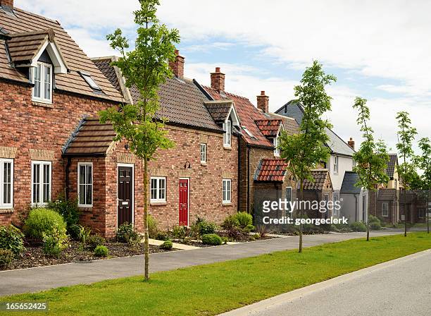 row of modern houses - uk stock pictures, royalty-free photos & images