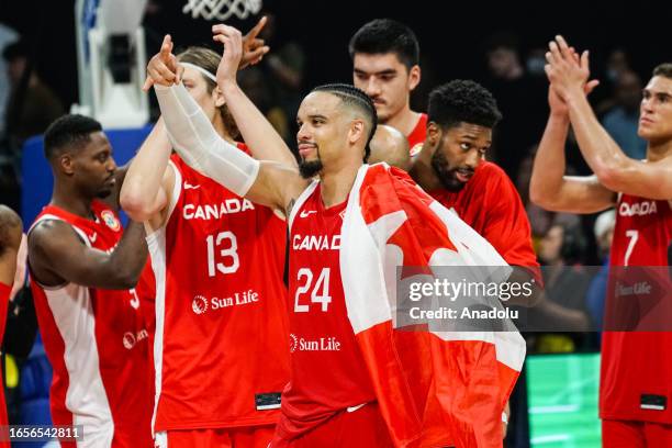 Players of Team Canada celebrate as they win against Team USA during match at FIBA World Cup 2023 at Mall of Asia Arena in Pasay, Philippines on...