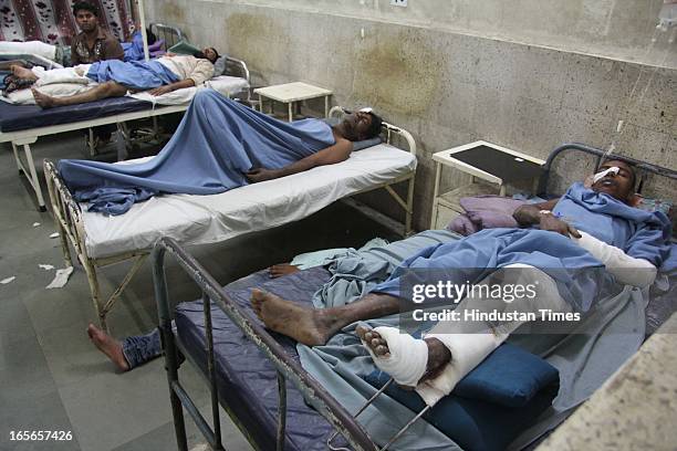 Injured people who survived the building collapse at Lucky compound admitted at Shivaji Hospital on April 5, 2013 in Thane, India. The death toll has...