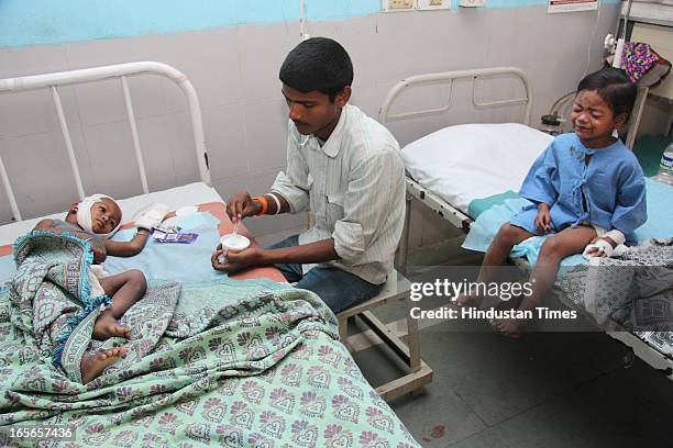 Injured children who survived the building collapse at Lucky compound admitted at Shivaji Hospital on April 5, 2013 in Thane, India. The death toll...