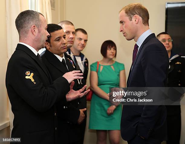 Prince William, Earl of Strahearn talks to members of the crew during a visit the Astute-class Submarine Building at BAE Systems on April 5, 2013 in...