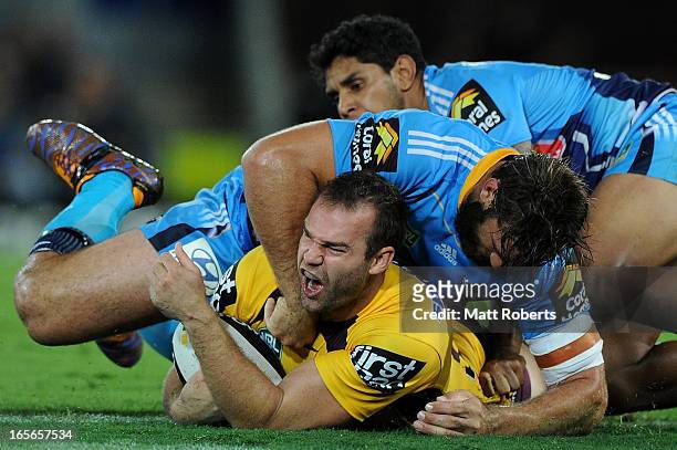 Scott Anderson of the Broncos reacts in the tackle during the round five NRL match between the Gold Coast Titans and the Brisbane Broncos at Skilled...
