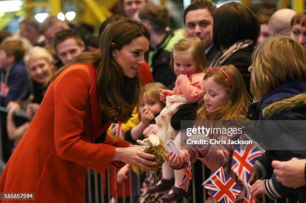 Catherine, Countess of Strathearn receives a gift from a well-wisher as she visits the Astute-class Submarine Building at BAE Systems on April 5,...
