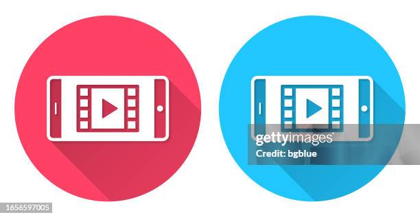 ilustrações de stock, clip art, desenhos animados e ícones de watch video on smartphone. round icon with long shadow on red or blue background - netflix