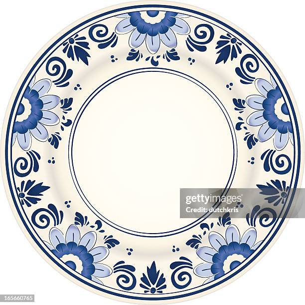 an antique blue and white plate - blue plate stock illustrations