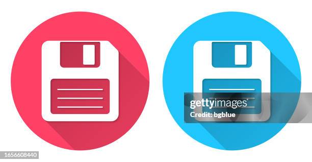 floppy disk. round icon with long shadow on red or blue background - two magnets stock illustrations