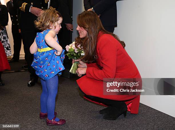 Catherine, Countess of Strathearn talks to Maizie Yeardley during a visit the Astute-class Submarine Building at BAE Systems on April 5, 2013 in...