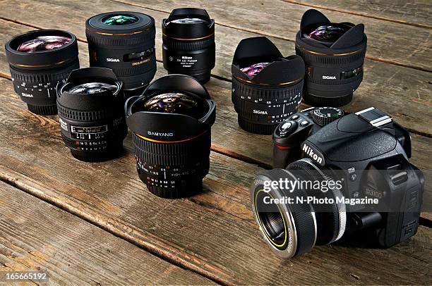 Nikon D3100 DSLR camera and a selection of fisheye lenses photographed during a studio shoot for N-Photo Magazine/Future via Getty Images, August 7,...