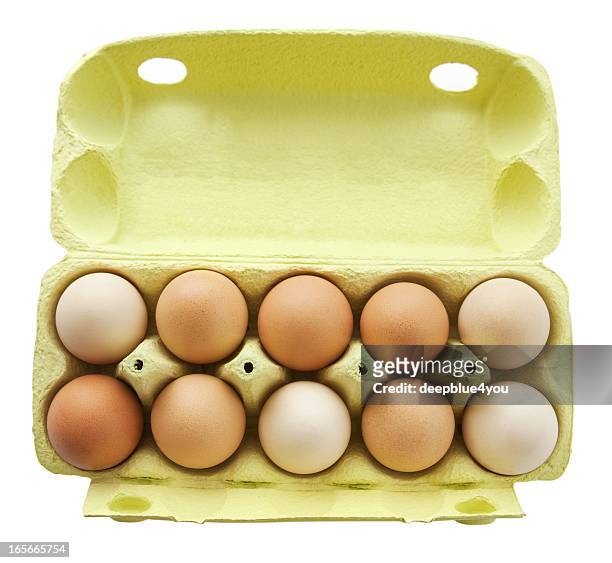 ten eggs in a open yellow box upper view isolated - äggkartong bildbanksfoton och bilder