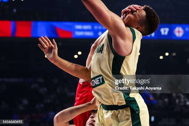 Dante Exum of Australia drives to the basket against Giorgi Shermadini of Georgia during the FIBA Basketball World Cup 2nd Round Group K game between...