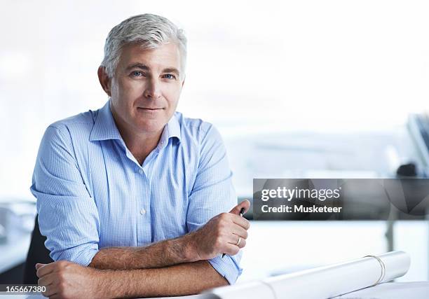 Architect Using Camera Experienced Architect Looking Into Camera High-Res Stock Photo - Getty ...