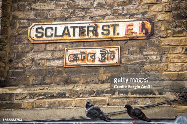 sclater street sign - foreign language stock pictures, royalty-free photos & images