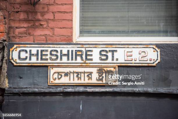cheshire street sign - foreign language stock pictures, royalty-free photos & images