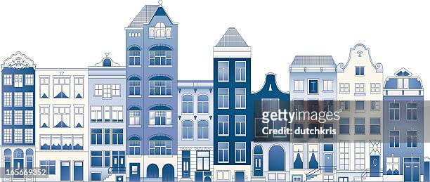 delft blue row houses - dutch culture stock illustrations