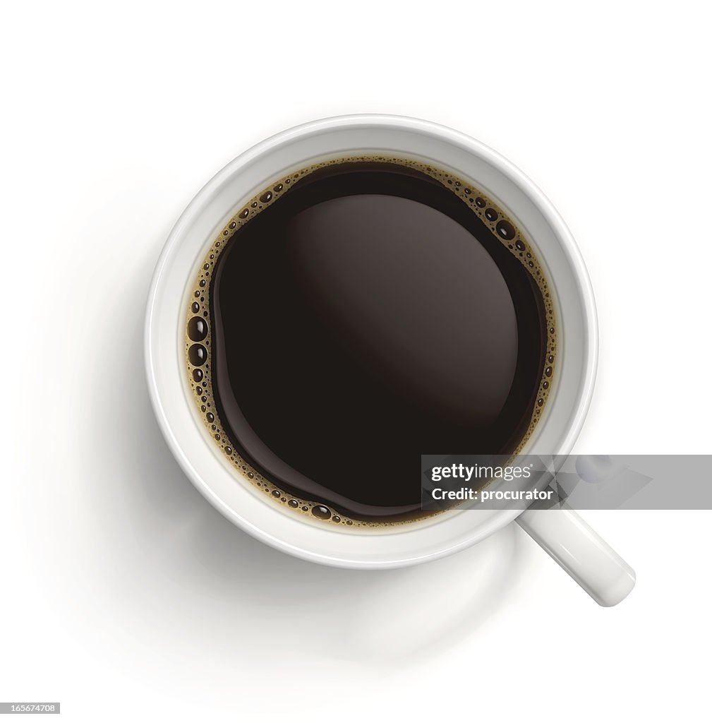 Copo branco com café preto