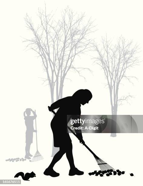 Autumn Black People Raking Leaves Photos and Premium High Res Pictures ...