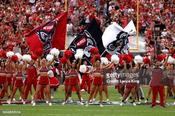 Cheerleaders of the NC State Wolfpack perform during the game against the Notre Dame Fighting Irish at Carter-Finley Stadium on September 9, 2023 in...