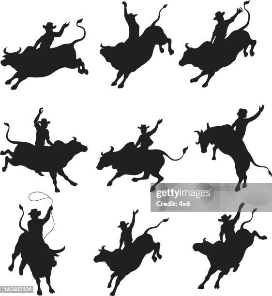 stockillustraties, clipart, cartoons en iconen met cowboys balancing on bulls in rodeo - bull riding