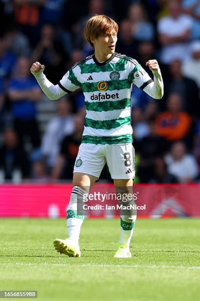 Kyogo Furuhashi of Celtic celebrates after scoring the team's first goal during the Cinch Scottish Premiership match between Rangers FC and Celtic FC...