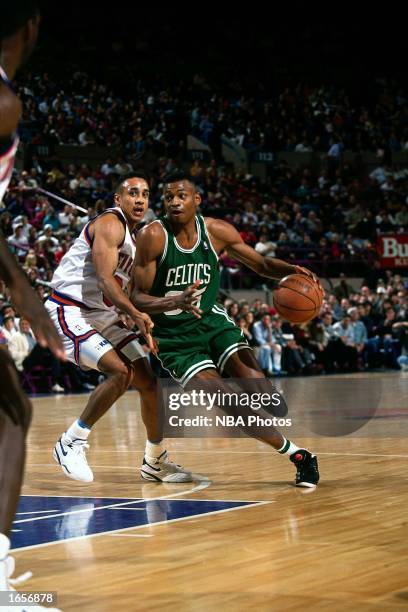 Reggie Lewis 32 Reggie Lewis Basketball Player Stock Photos, High-Res Pictures, and ...